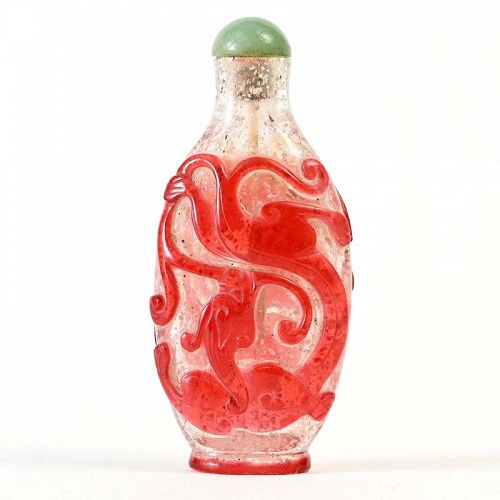 Chinese Red Overlay Snowflake Glass Snuff Bottle w. Chilong, c. 1900.