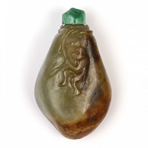 Chinese Celadon Brown Jade Pebble Snuff bottle w. Monkey, 1st H. 20th.