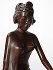 Bali Woodcarving: Statue of a Sitting Woman.