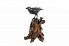 Japanese bronze crow un a tree stump, Meiji