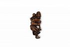 Japanese netsuke Dutchman with child and trumpet