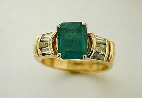 An Emerald And Diamond Ring