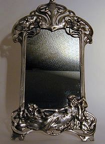 A Figural Mirror