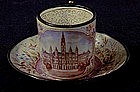 A Viennese Enamel Miniature Cup and Saucer
