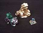 Group of three antique Shishi knobs