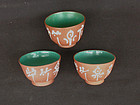 Three Chinese Yixing / Zisha tea bowls, c 1900