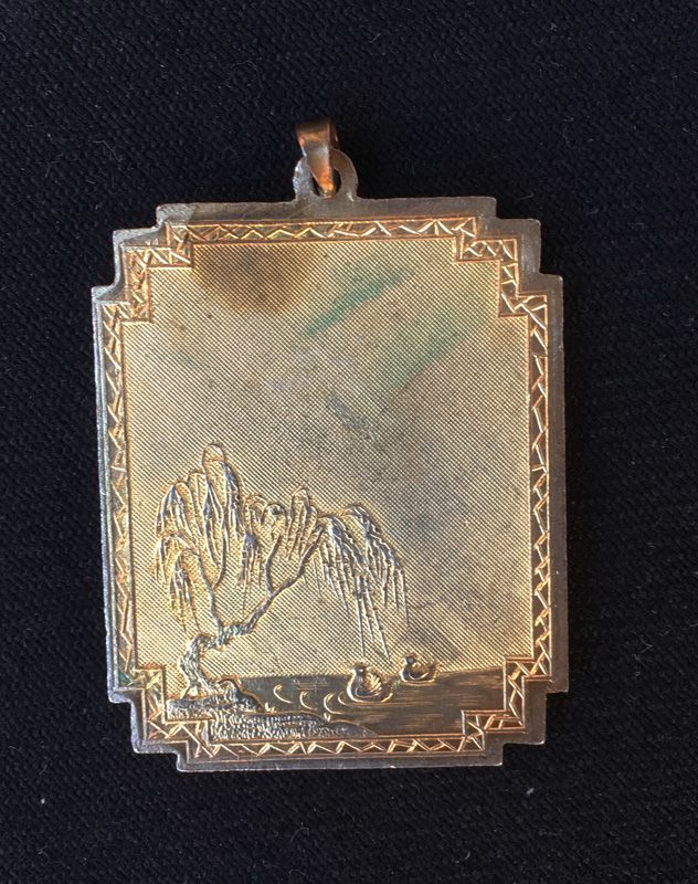 Chinoiserie gilt metal and enamel pendant, c 1920