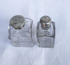 Cut crystal silver lidded scent bottles, 19th century