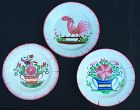 Three French faience plates, Les Islettes: rooster & flower baskets