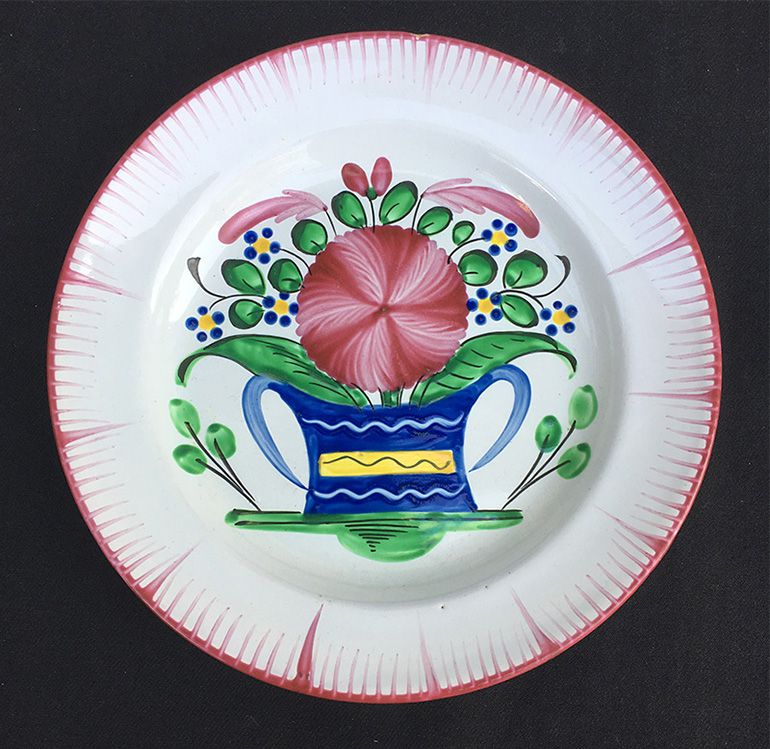 Three French faience plates, Les Islettes: rooster &amp; flower baskets