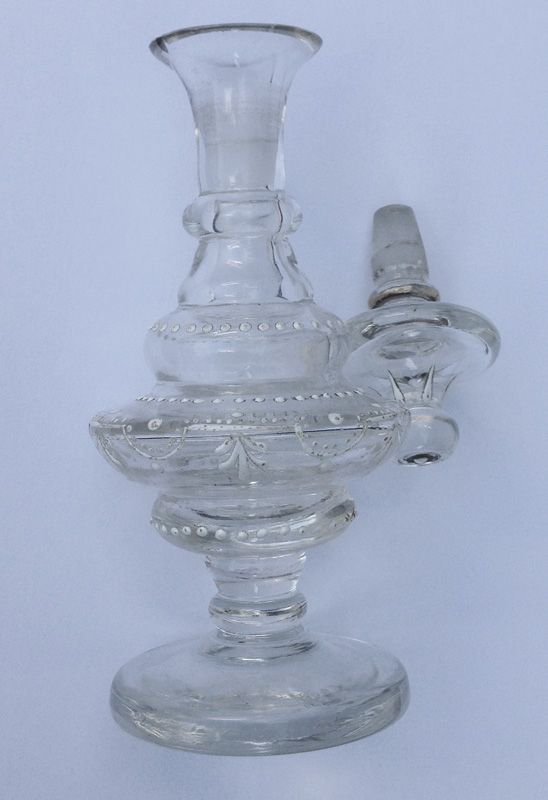 Clear glass perfume bottle enameled in white, probably Scandinavian