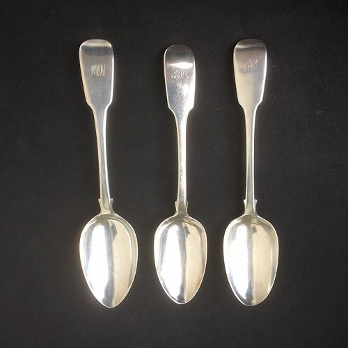 Three good silver fiddle spoons for serving, Georgian and Victorian