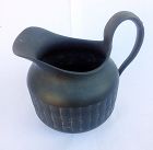 Black basalt milk jug, Georgian