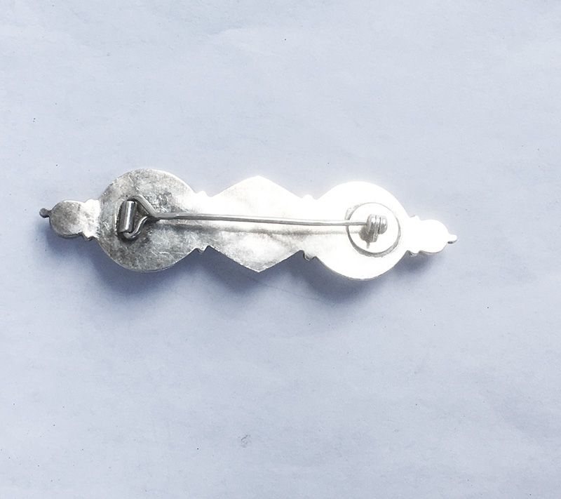 Celtic revival bar pin, Arts and Crafts, silver and moonstone
