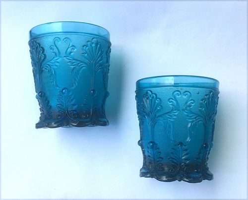 Victorian blue pressed glass beakers, a pair