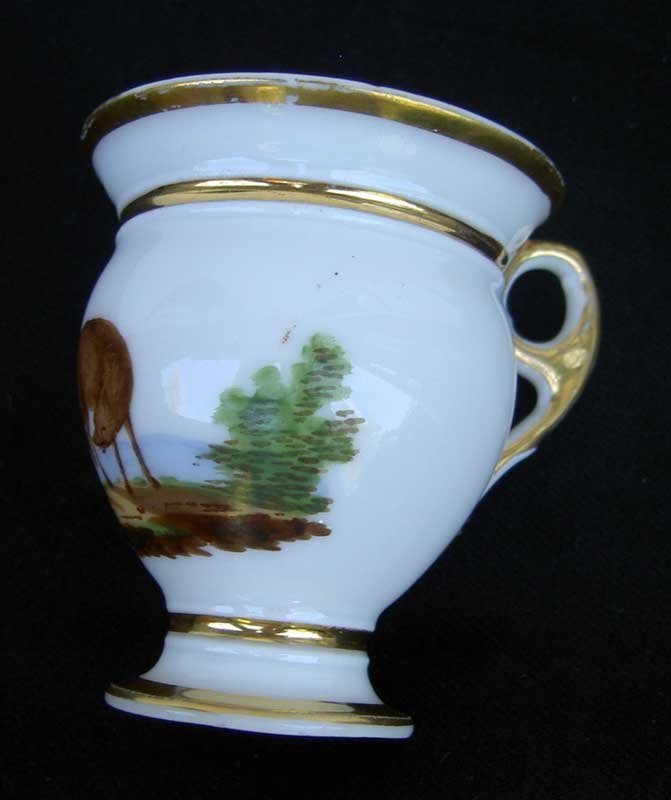 French cabinet cup and saucer with fox &amp; rocks