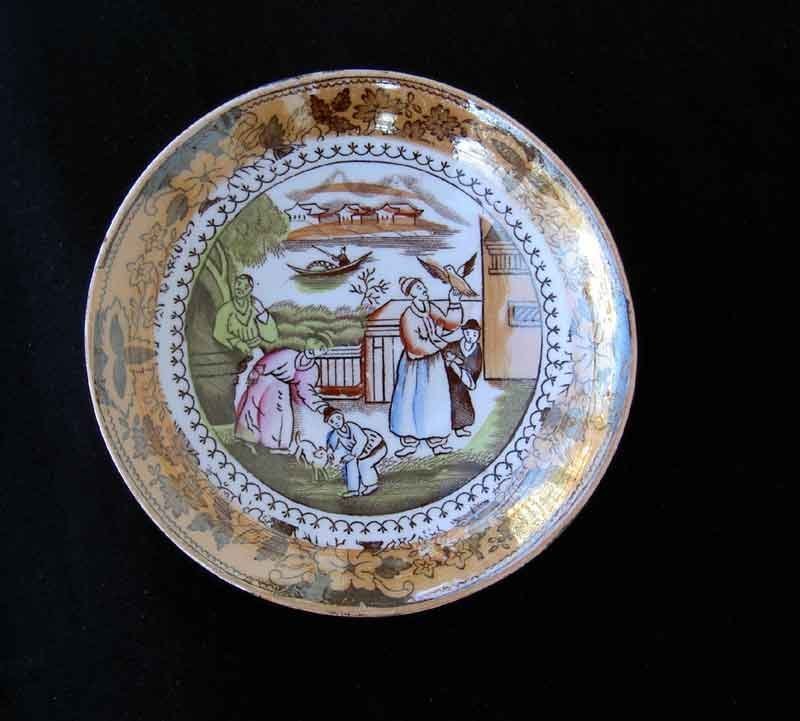 English Chinoiserie lustreware saucer dishes