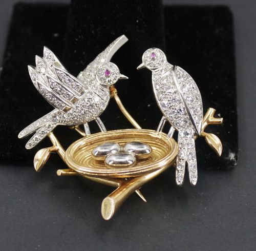 Antique diamond two bird brooch in platinum and 18k gold