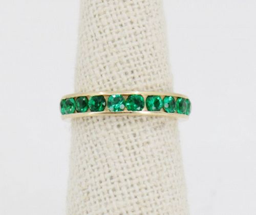 Emerald full eternity band ring in 14k yellow gold