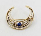 Antique natural sapphire diamond crescent brooch in 18k gold