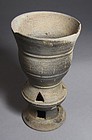 A Very Rare Earthen-Ware Jingle-Bell Libation Cup