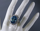 Lady's Platinum Blue Topaz and Diamond Dinner Ring