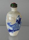 Qing Dy Boy on Buffalo Blue and White Crackle Glaze Snuff Bottle
