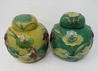 Pair of Chinese Sancai Ginger Jars with Applied Cranes and Lotus