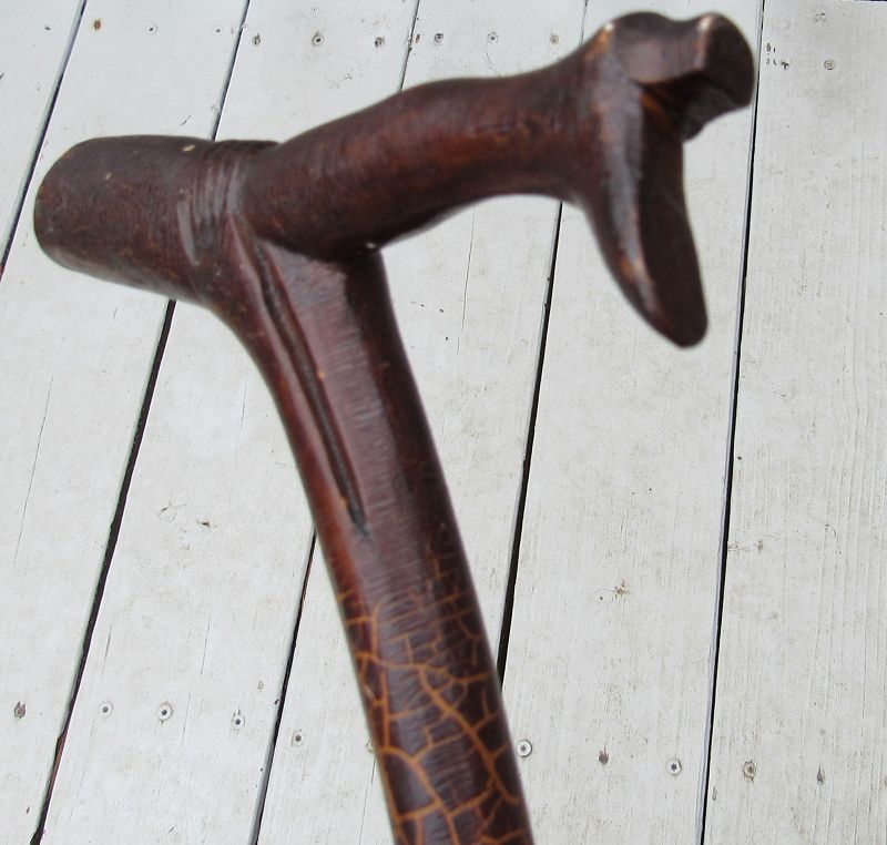 Antique Walking Stick of Hand Holding Leg with Boot