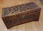 Old Asian Camphor Wood Chest with Carved Dragons Amongst Clouds