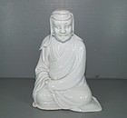 Qing 18th century blanc de chine dehua seated damo