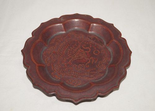 Qing 19th century Shiwan red glaze plate with dragon motif