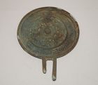 Tang dynasty bronze mirror lion motif