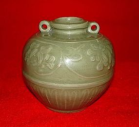 Yuan longquan celadon jar moulded flower motif