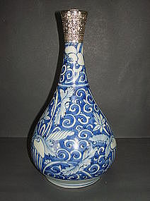 Ming Wanli white on blue ground bottle vase