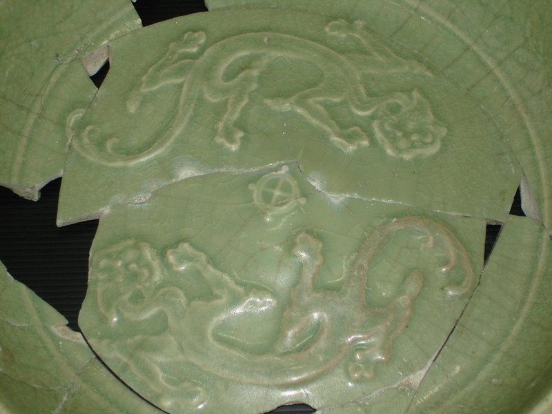 Sample of Yuan celadon dish with unusual dragon motif