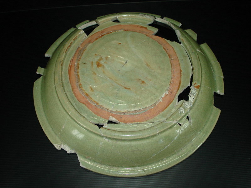 Sample of Yuan celadon dish with unusual dragon motif