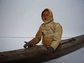 Eskimo Canoo with Peddling Figure