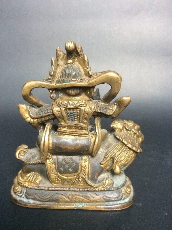 Sino Tibetan Gilded Bronze Vaishravana on a Lion 19th Century