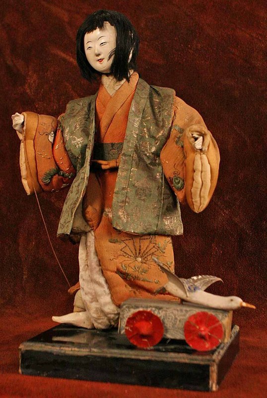 Edo Period Isho Ningyo Pulling a Wagon with a Crane
