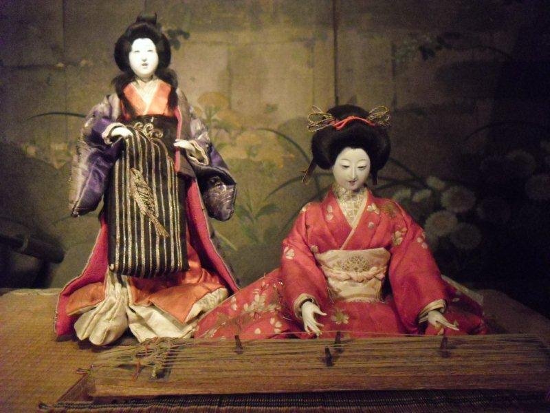 Isho Ningyo of Two Geisha Singing and Playing Music