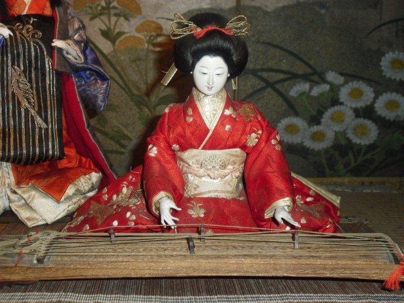 Isho Ningyo of Two Geisha Singing and Playing Music