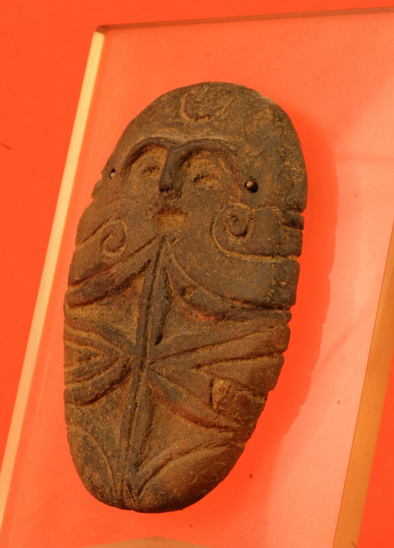Very Rare Jomon Period Terracotta Disc of a Dogu Figure