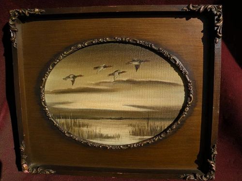 Decorative painting of ducks flying over a marsh