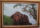 Signed landscape painting red rocks and tree