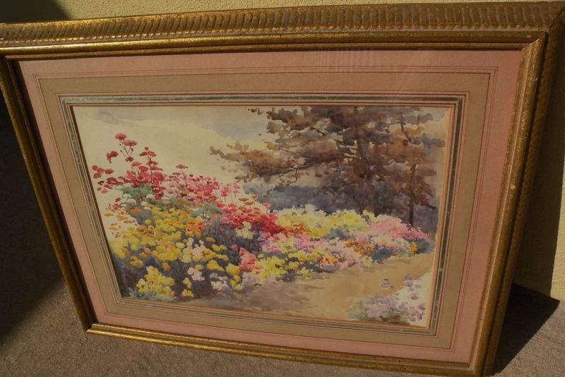 Impressionist watercolor painting of a colorful flowering garden