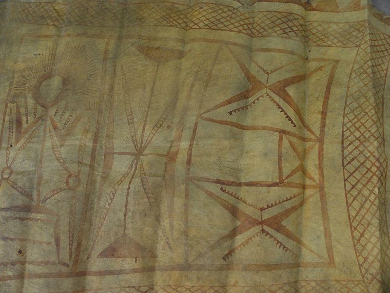 African vintage cow hide blanket painted with abstracted figures and symbols