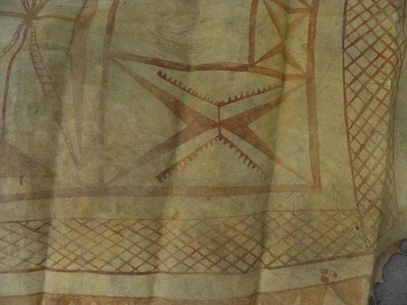 African vintage cow hide blanket painted with abstracted figures and symbols