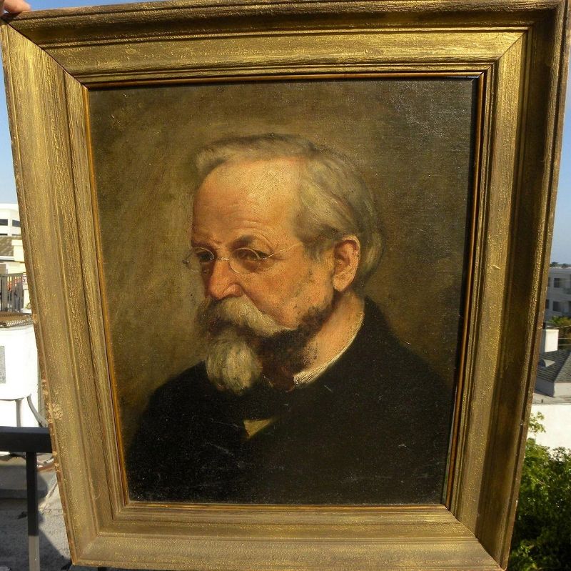Antique portrait painting of a man signed with initials