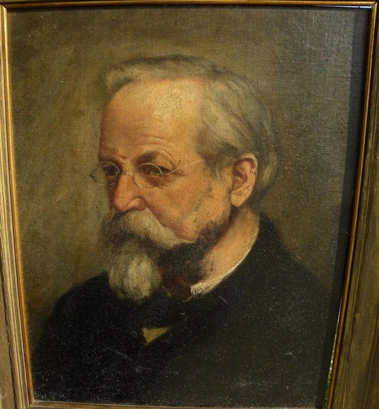 Antique portrait painting of a man signed with initials